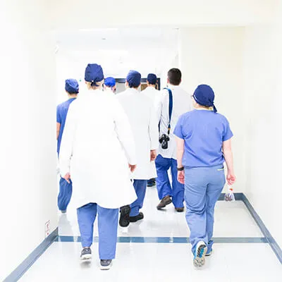 Nurses and doctors in hallway