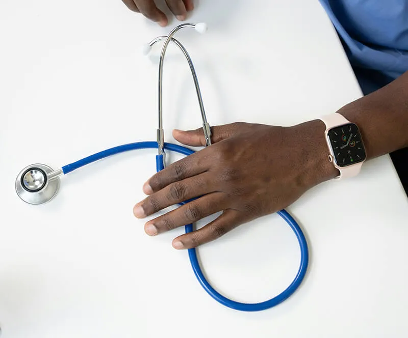 Hand holding stethoscope