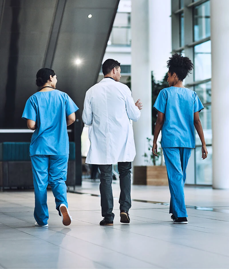 Nurses talking to doctor